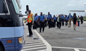 The West Indies players on the tarmac of the Eugene F. Correia International Airport on Monday afternoon (Photo: Avenash Ramzan)