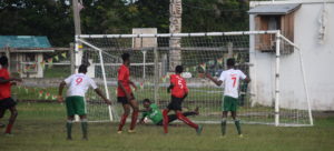 Nicholas McArtur (Number 7) slots one past the keeper.
