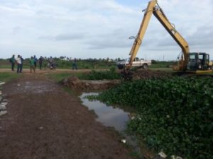 Excavator-clearing-channel-420x315