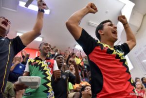 Top male player Ben Mekdeci lets out a roar to celebrate Guyana's vctory