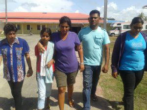 From left- Mother of Naresh Rooplall, daughter of Pawan, Indrowatie Rooplall their village pastor and another relative