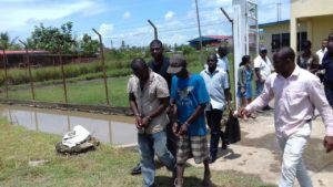 Suspects being escorted to the Crime scene earlier today