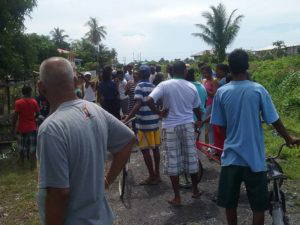 Residents gathered at the scene of the incident