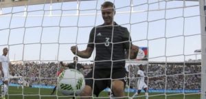 Germany's Lukas Klostermann celebrates scoring the opening goal of the second semi-final