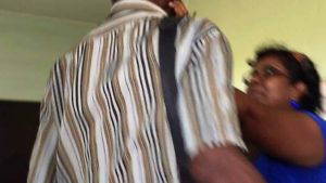 Photo of Overseer assaulting reporter