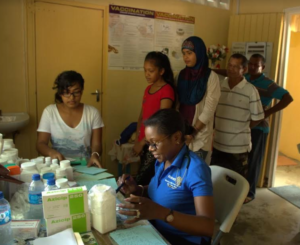 Dr. Karen Boyle assisting with medical outreach