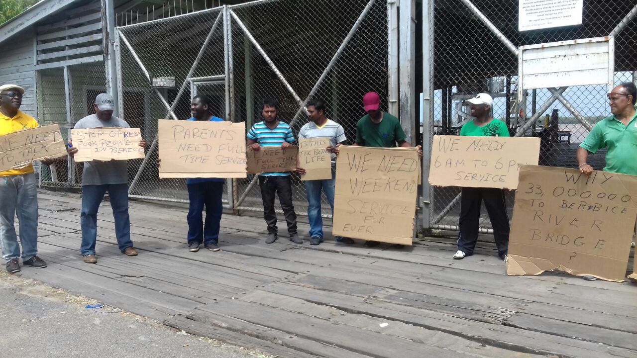 Berbice hire car drivers protesting the change in  water taxi schedule