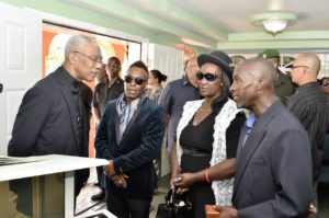 President David Granger expressing his condolences to the children of the late Mr. Malcolm Corrica aka Lord Canary (MOTP PHOTO)