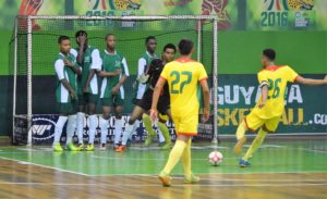 Guyana's Kendolph Lewis, who scored the first goal for Guyana, about to take a free-kick in the second half.