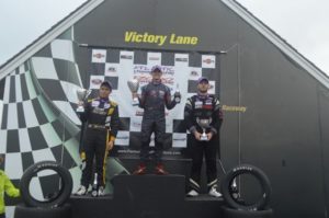 Calvin Ming (left) on the podium after the final race on Sunday