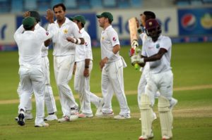 Wahab Riaz and the Pakistan players celebrate the dismissal of Jermaine Blackwood