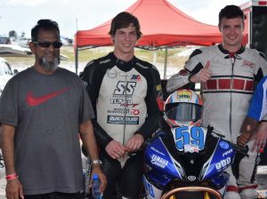 Managing Director of Mohamed's Enterprise, Nazar Mohamed with Bryce Prince (second from left) and Matt Truelove (Rawle Toney photo)