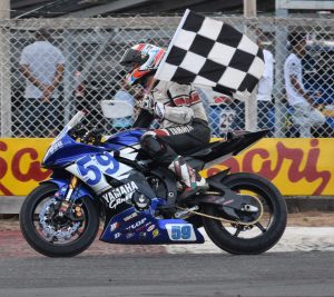 Matt Truelove with the chequered flag at the South Dakota Circuit