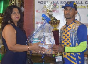 Wazir Hussain receives his Man-of-the-Match award