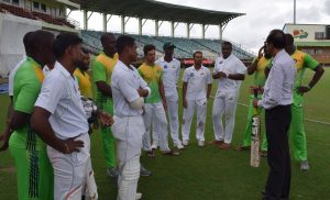 The Guyana Jaguars players being given words of advice and encouragement by Guyana-born Trinidad and Tobago cricket analyst, Brij Parasnauth