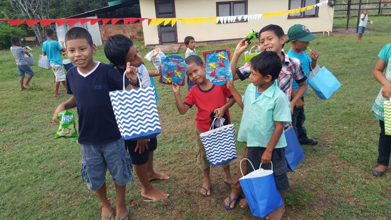Minister Norton spreads Christmas cheer to some 250 Region 9 children