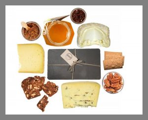 a-gift-bag-full-of-gourmet-cheeses