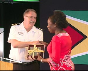 Minister Nicolette Henry received a gift from Captain, Randy Grebe