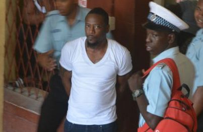 Guyanese man accused of shipping barrel with high powered guns, ammo