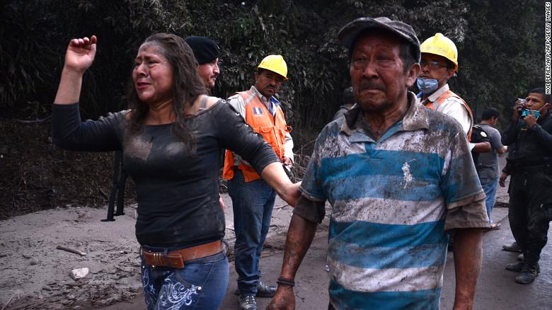 Guatemalans struggle to recover the dead buried by volcano eruption